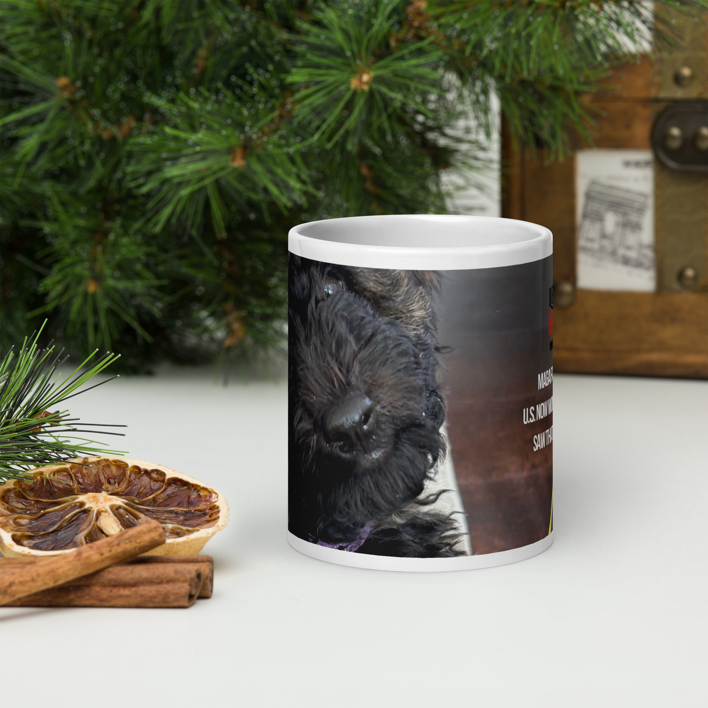 20 oz white ceramic mug, front view, printed in muted tones and with a poodle and political satire in the form of Haiku, in a holiday setting. Haiku is not visible in this view.