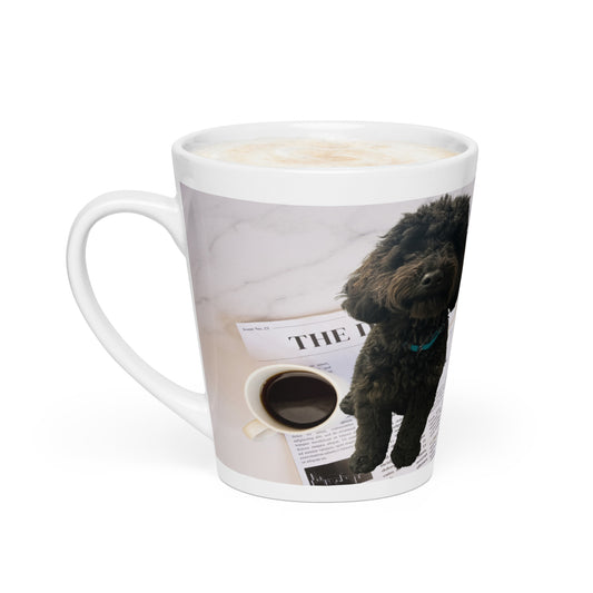 White glossy ceramic mug with a design of a dog sitting on a newspaper next to a cup of coffee