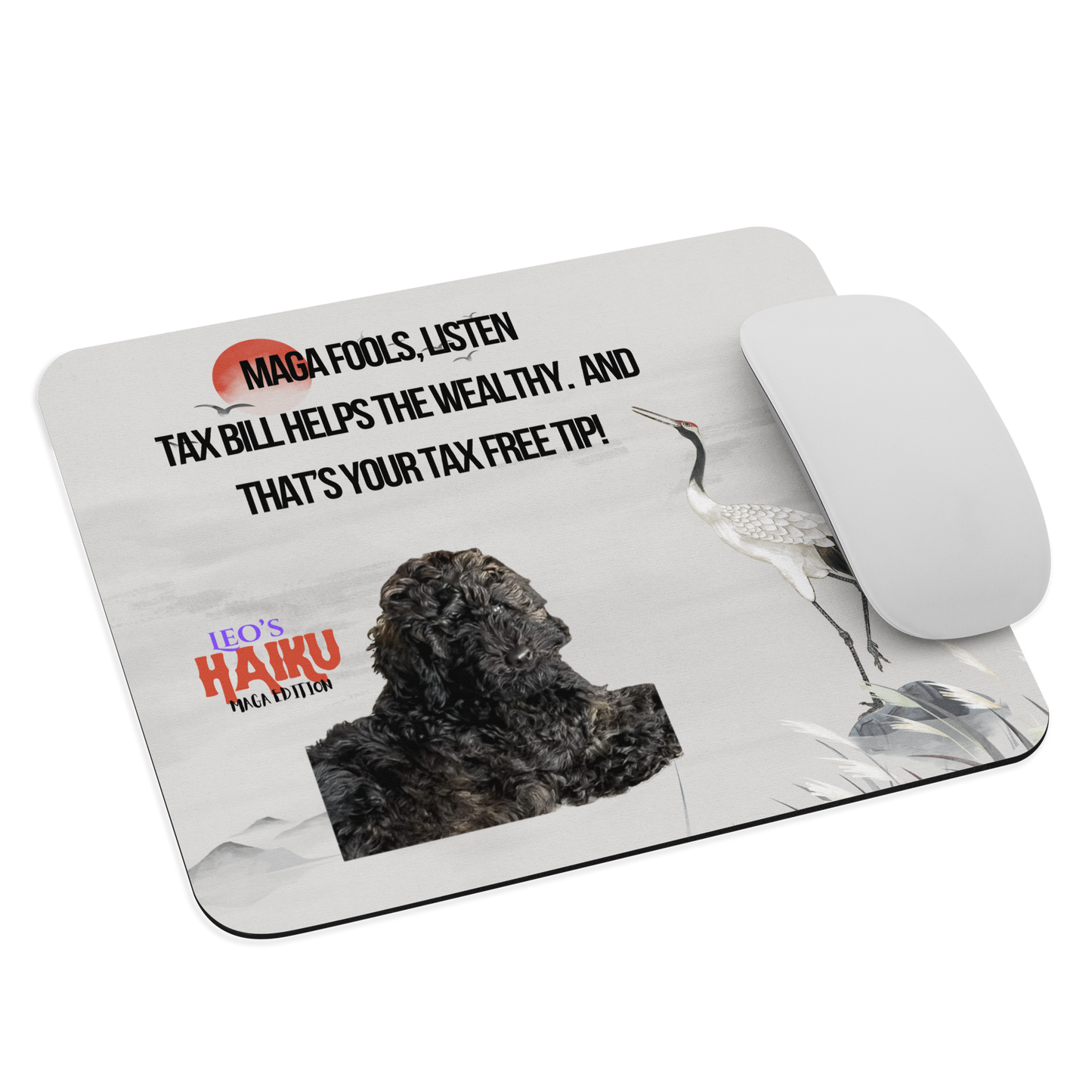 Standard-sized mouse pad printed with a light background with an oriental theme including a red sun, a heron and distant mountains. A poodle and political satire in Haiku format are super-imposed on the design. A computer mouse sits on the right side of the pad.