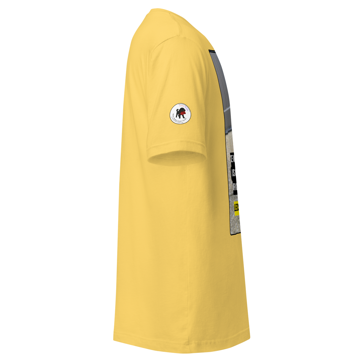Yellow t-shirt with a logo on the sleeve against a white background