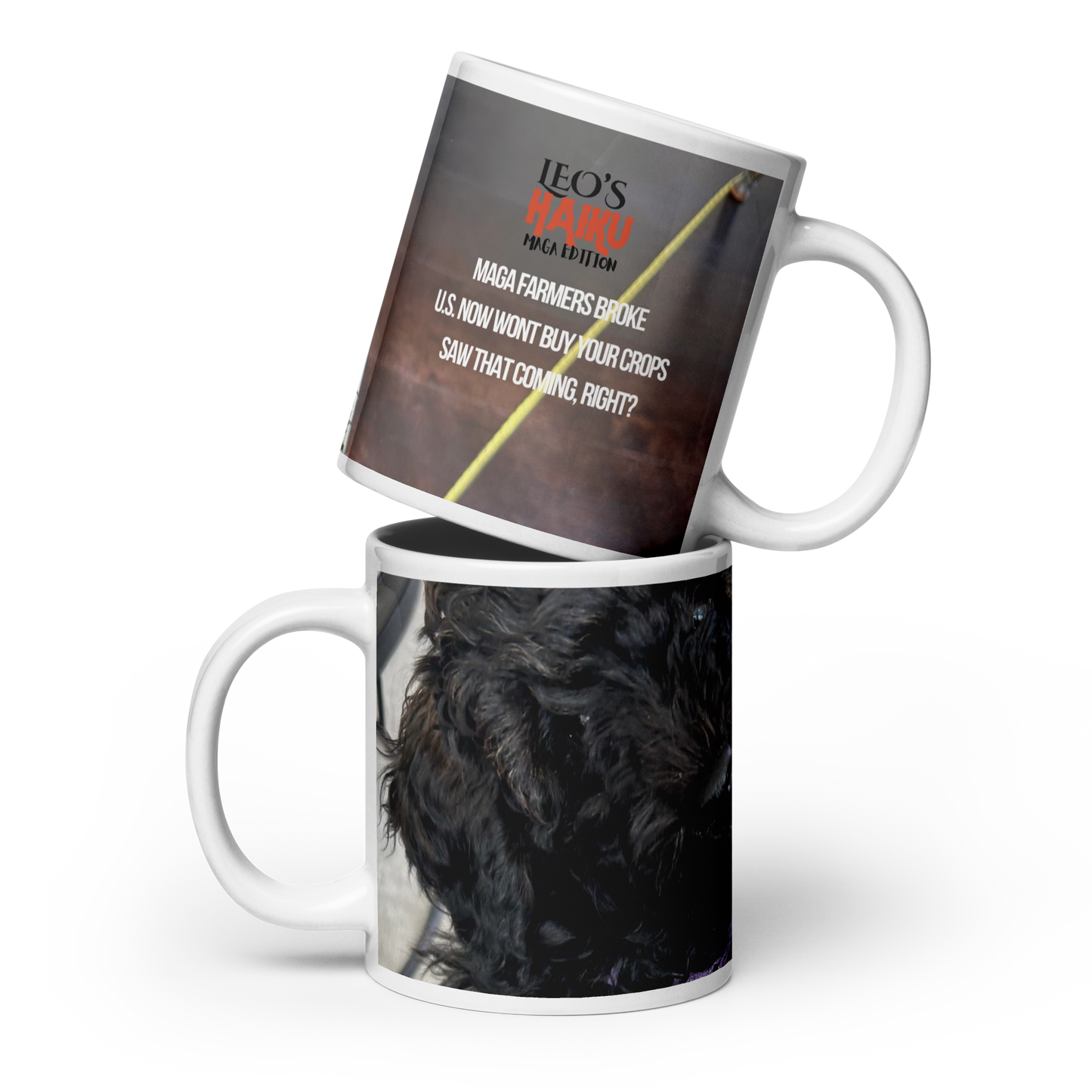 2 20 oz mugs stacked; Top one, handle on the right, Haiku showing on muted background.  Botton one, handle on the left, shows the face of a black poodle.