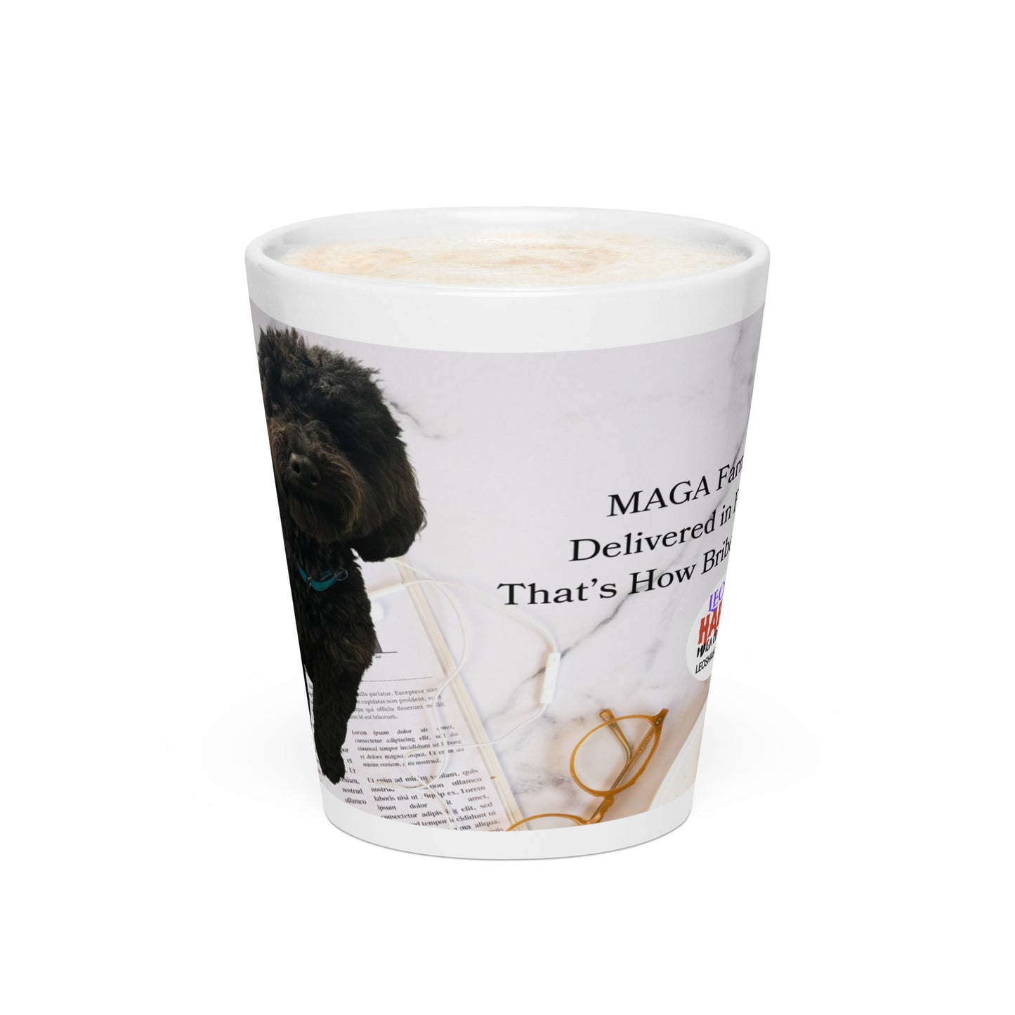 White glossy ceramic mug printed with image of a kitchen counter with a back dog sitting on a newspaper and glasses.  Political, satirical, anti-MAGA haiku is partially visible as is the text logo for leoshaiku.com