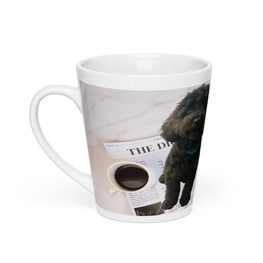 White glossy ceramic mug with a design of a dog sitting on a newspaper next to a cup of coffee