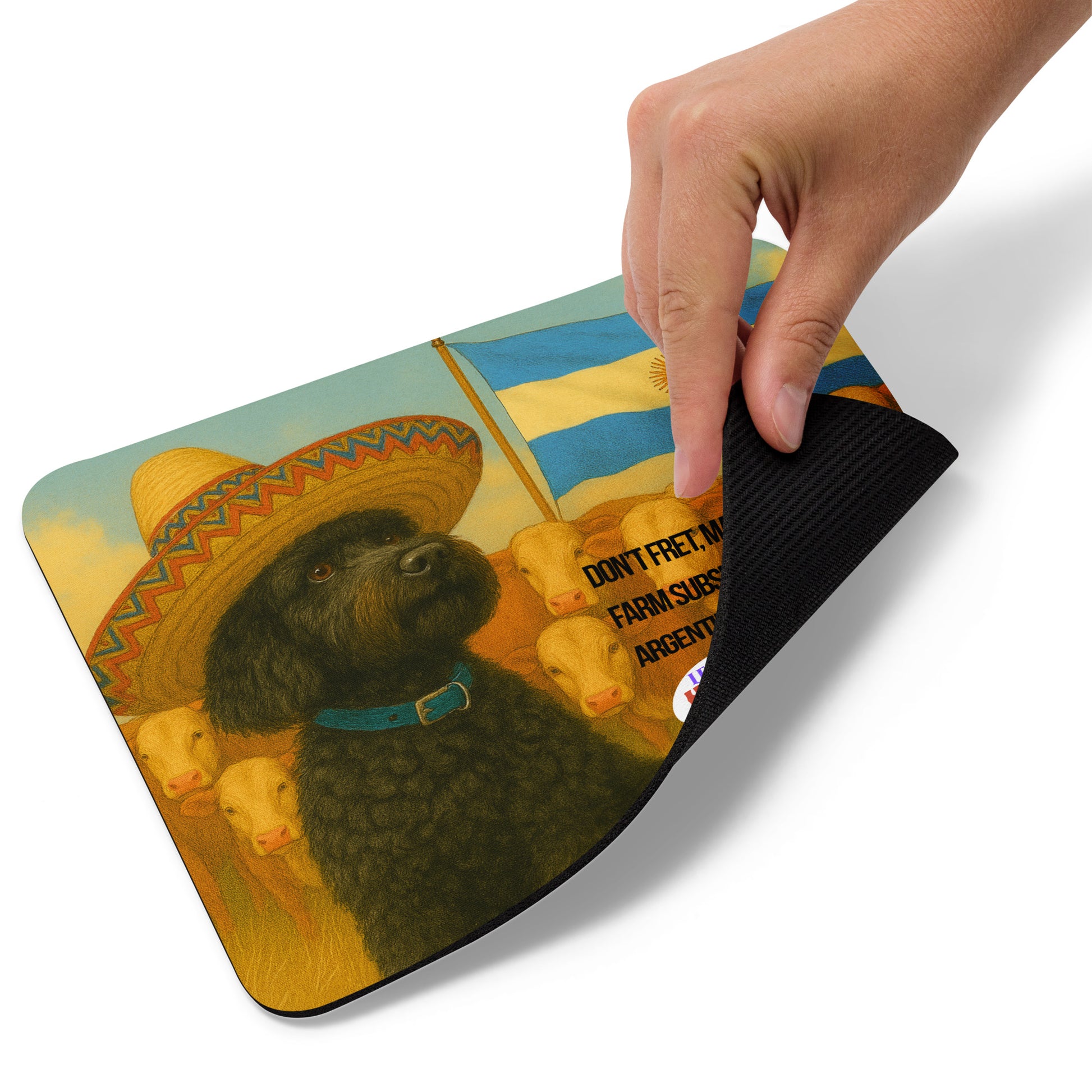 Standard Mouse pad printed with the image of a dog in a sombrero in a herd of cattle, under the flag of Argentina.  A political, satirical, anti-Maga haiku is partially visible.