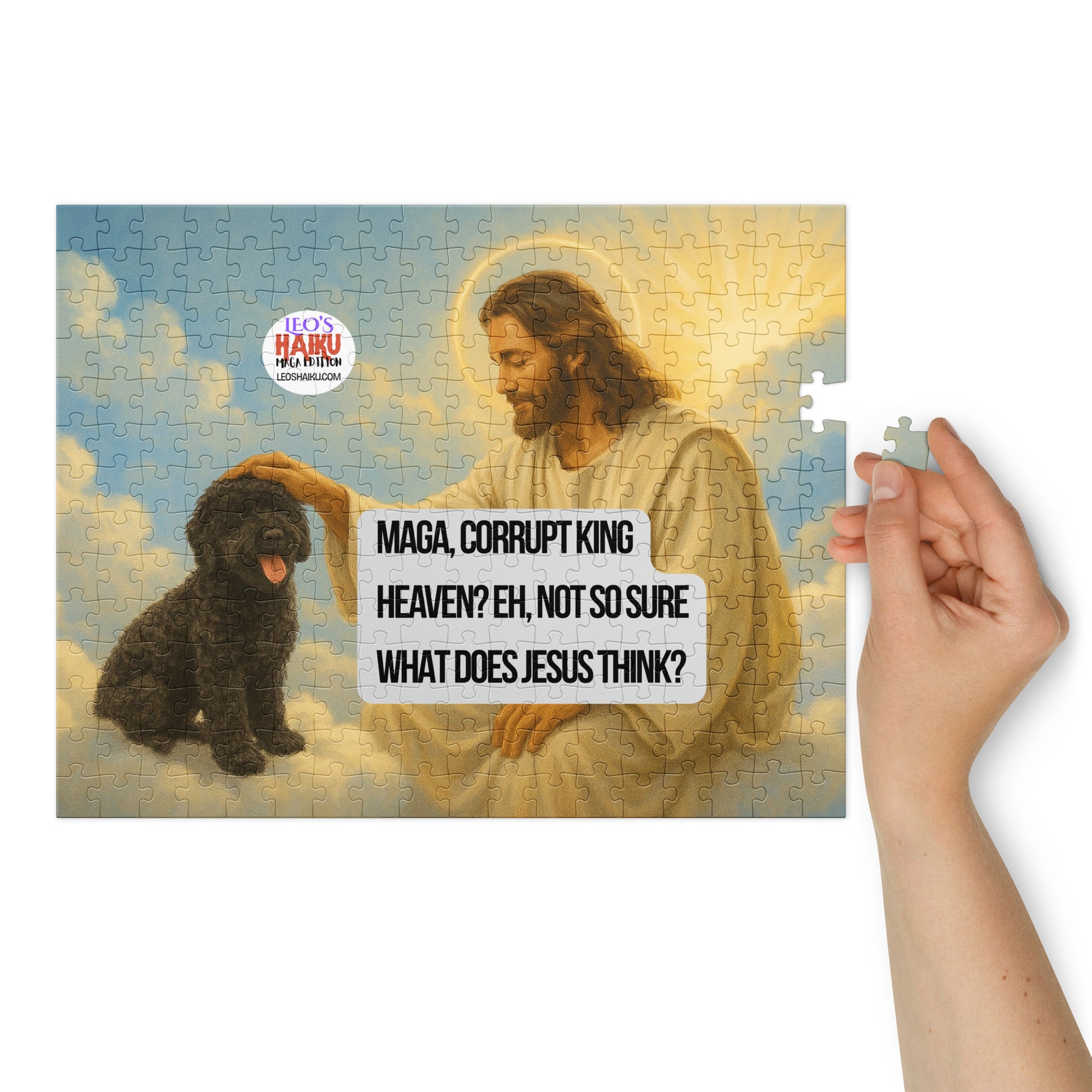 Jigsaw puzzle printed with the image of Jesus and Leo the Black Poodle floating on a cloud in Heaven.  A hand on the right is ready to drop in the last piece.  A political, satirical, anti-MAGA haiku reads:
MAGA Corrupt King
Heaven? Eh, Not so Sure
What Does Jesus Think?
The text logo for leoshaiku.com is also displayed