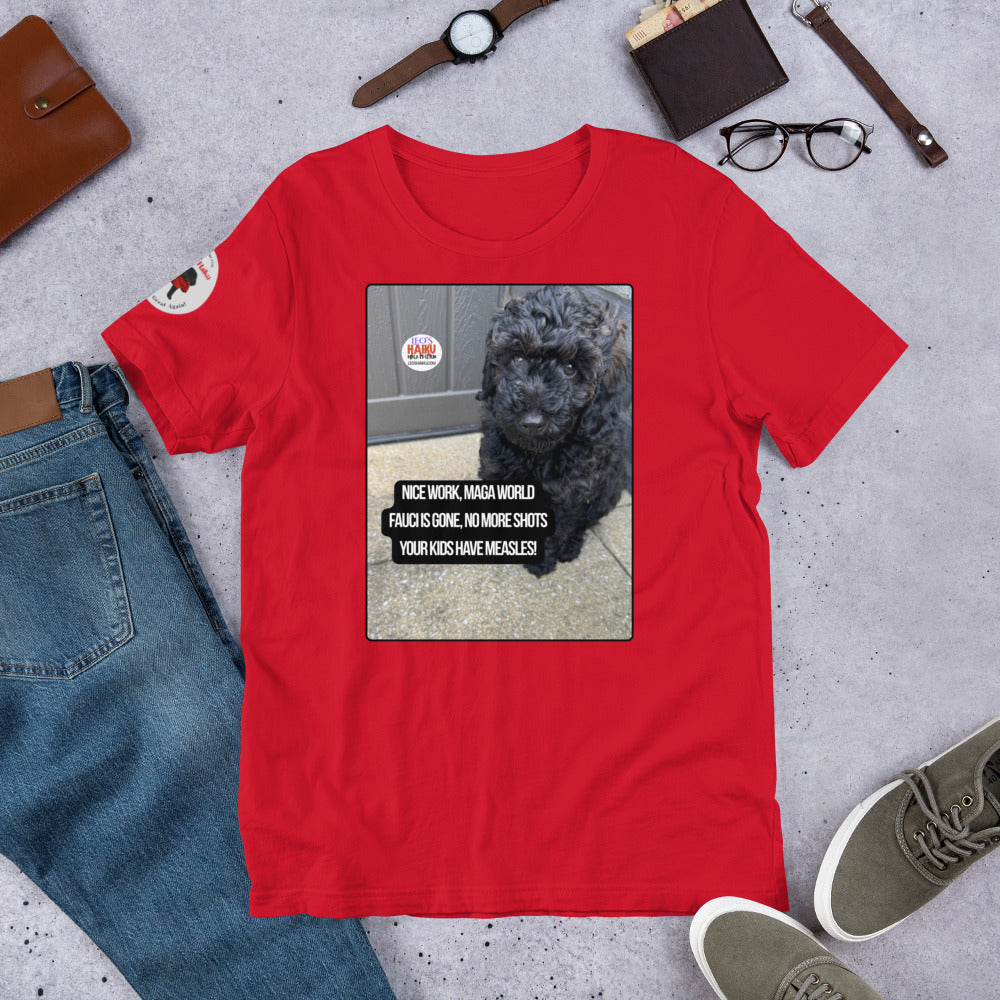 Red t-shirt surrounded by items that make an outfit - shoes, jeans, watch, wallet glasses, bracelet.  The t-shirt has the image of Leo the mini poodle and a political, satirical, anti-MAGA haiku that reads:
Nice Work, MAGA World
Fauci's Gone. No More Short
Your Kids Have Measles!
The circular text logo for leoshaiku.com is top left.
