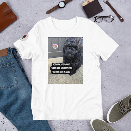 White t-shirt surrounded by items that make an outfit - shoes, jeans, watch, wallet glasses, bracelet.  The t-shirt has the image of Leo the mini poodle and a political, satirical, anti-MAGA haiku that reads:
Nice Work, MAGA World
Fauci's Gone. No More Short
Your Kids Have Measles!
The circular text logo for leoshaiku.com is top left.