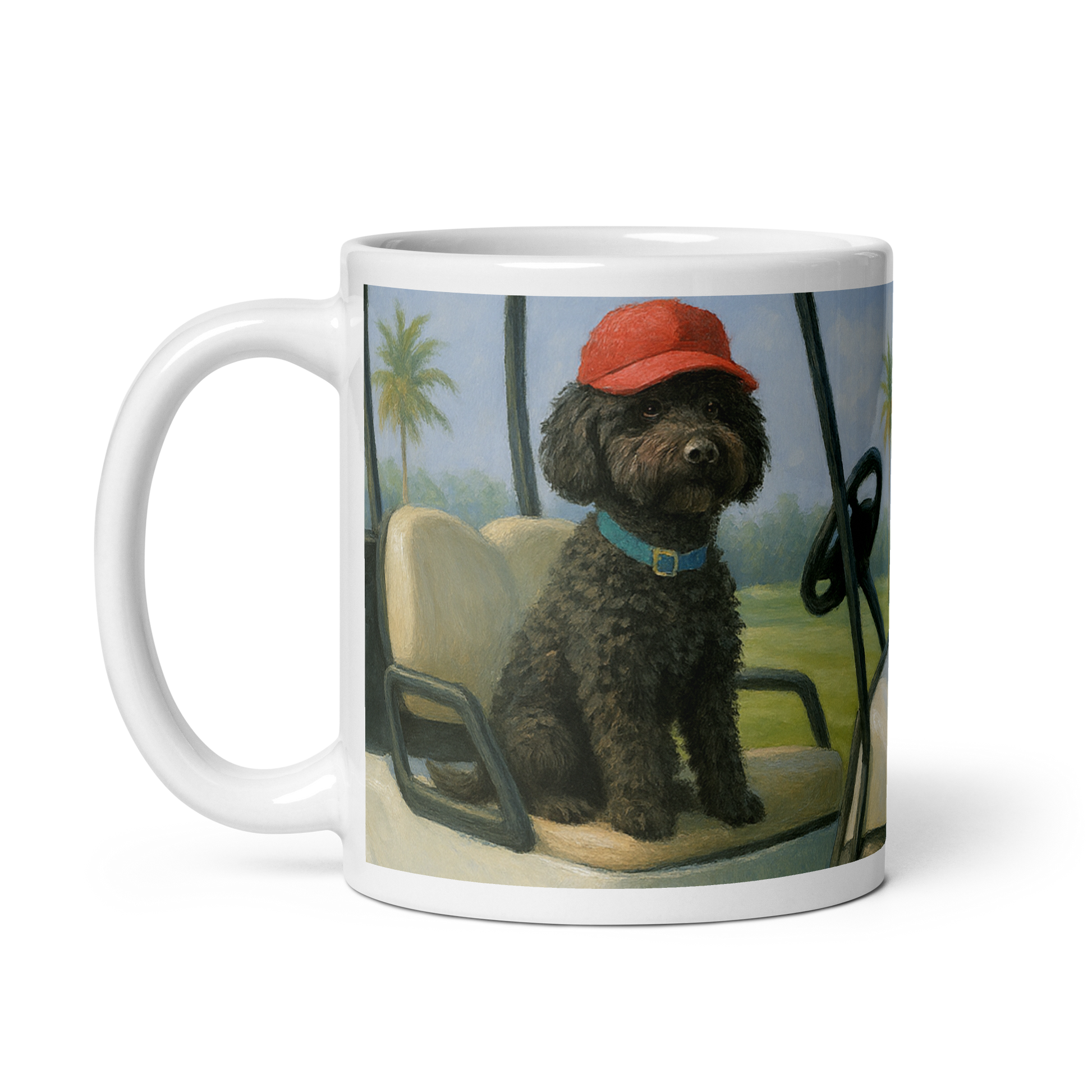 White glossy Ceramic Mug with a dog wearing a red cap and blue collar on a golfcart with a palm tree in the background.  Handle is on the left
