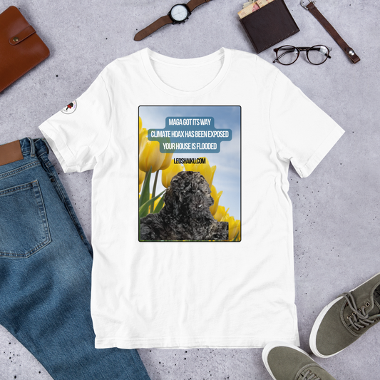 White t-shirt surrounding by jeans, shoes, glasses, watch.  T-shirt is printed with the image of a black dog in a field of yellow tulips.  A political, satirical, anti-MAGA haiku reads:
MAGA Got Its Way
Climate Hoas Has Been Exposed
Your House is Flooded!
Centered below it reads Leoshaiku.com