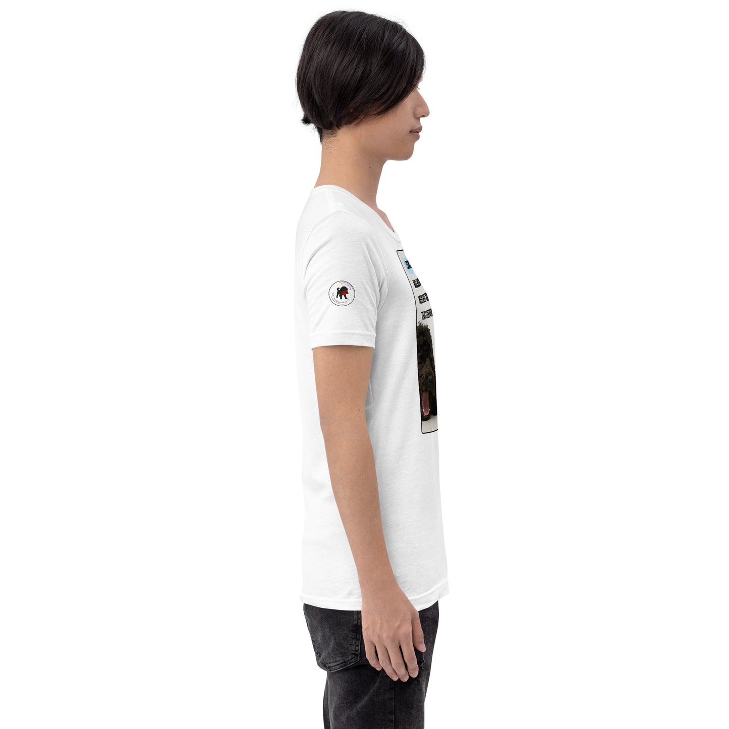 Young man in a white t-shirt facing right.  White circular logo on sleeve.
