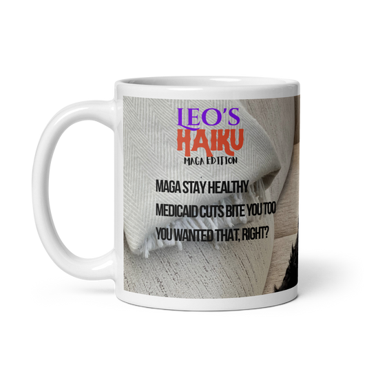 11 oz white ceramic mug, handle on the left,  printed with muted tones, a poodle and political satire in the form of haiku