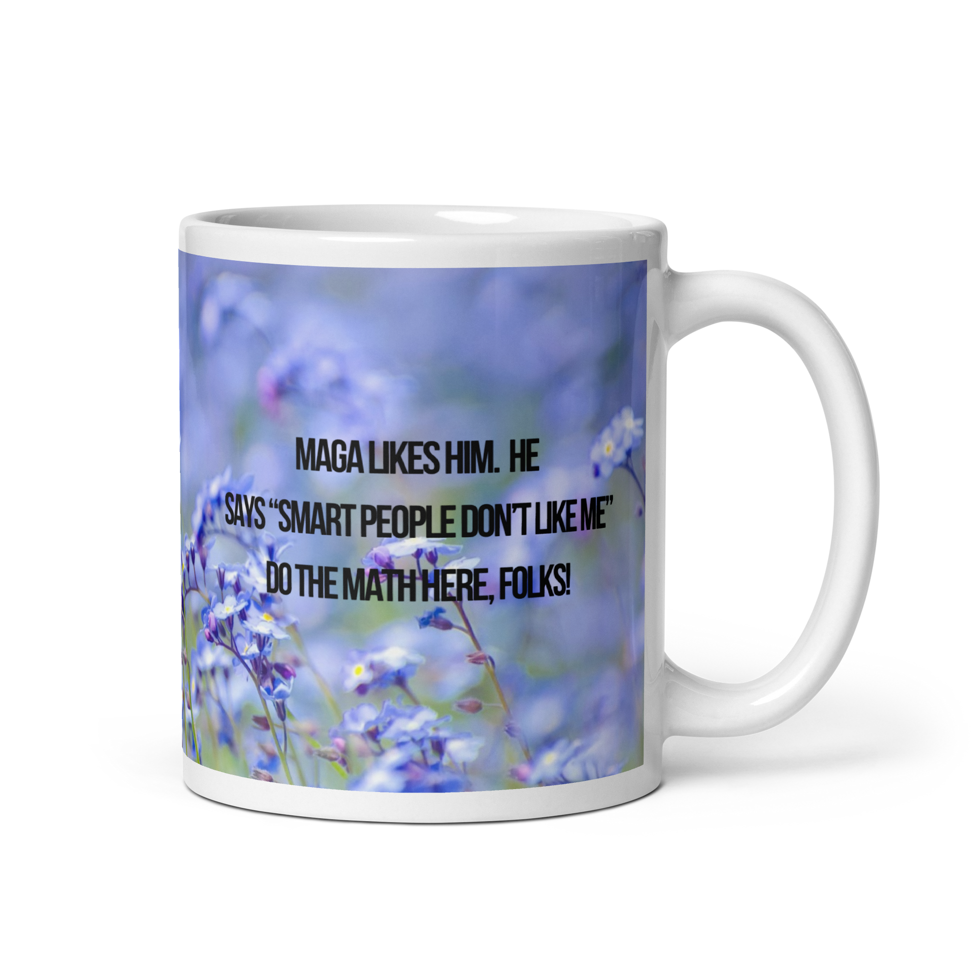20 oz white ceramic mug printed with design of blue flowers, a poodle, and political satire in the form of Haiku