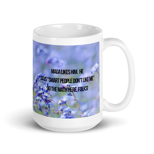 15 oz white ceramic mug printed with design of blue flowers, a poodle, and political satire in the form of Haiku