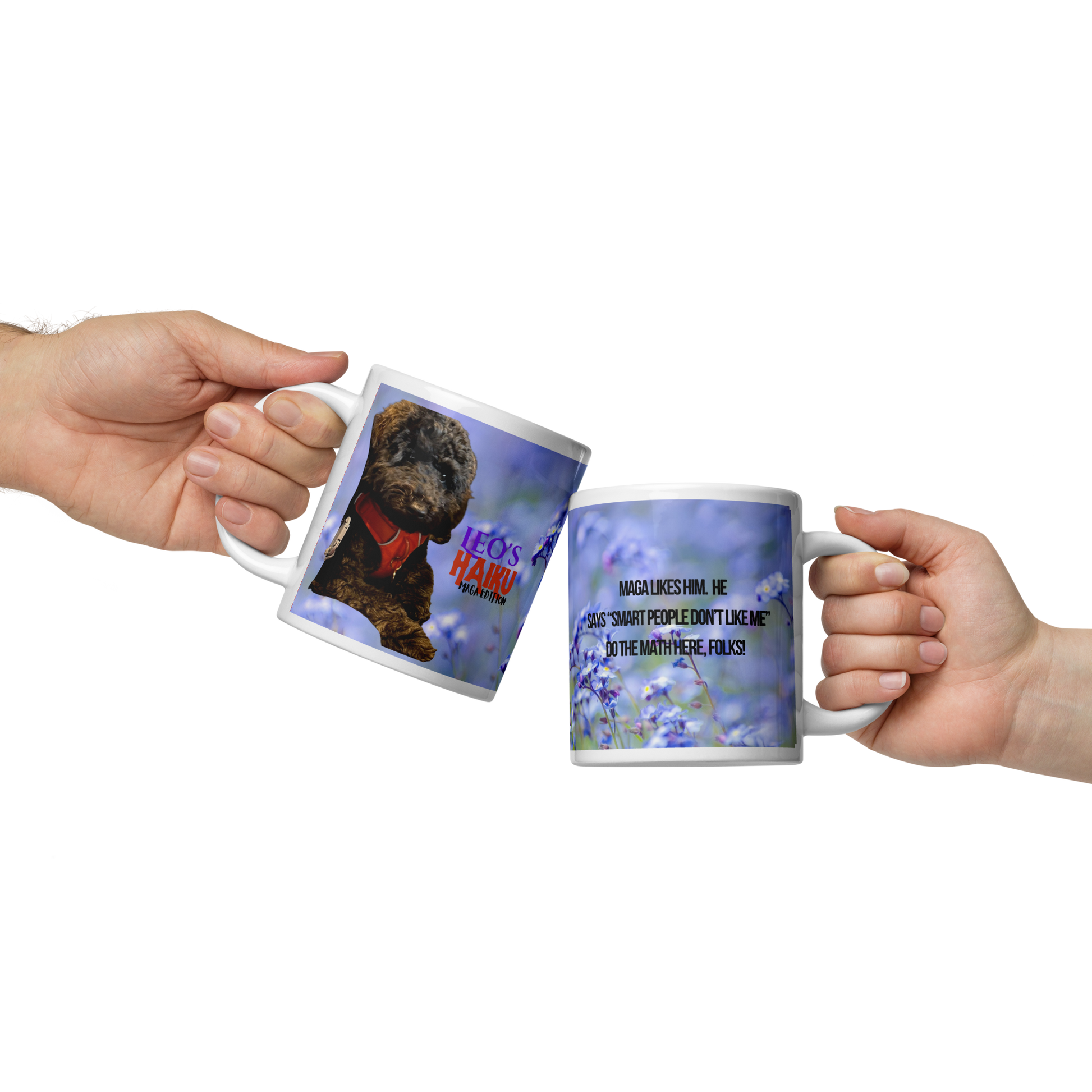 Two hands clinking 20oz white ceramic mugs in a toast.  One shows the poodle, the other shows the political satire in form of Haiku
